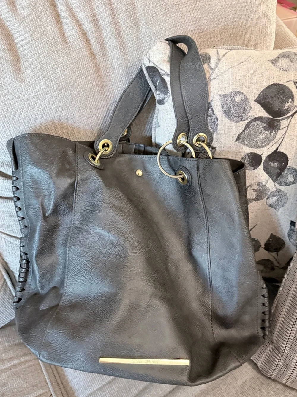 Steve Madden Black Leather Tote with Tassel and Gold Accents